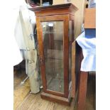 A stained beech glazed display cabinet, with single door and glazed sides 35cm square 93cm high