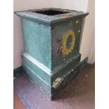 A Victorian cast iron garden plinth, of square form with wreath motif, 46cm square, 66cm high