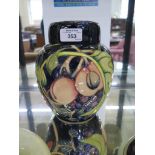 A Moorcroft Pottery 'Queens Choice' pattern ginger jar and cover, 2000, 20.5cm high