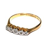 A five stone diamond ring set in 18 carat gold