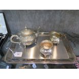 A three piece plated tea set, a plated tray, two white metal pheasants, etc