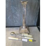 Two pickle forks, mother of pearl strainer, candlestick, etc