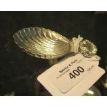 A silver shell shaped caddy spoon, Birmingham 1997