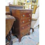 A mahogany chest of drawers, with brush slide and four drawers on outsplayed bracket feet, 48cm