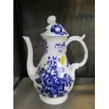 A Worcester style baluster coffee pot with blue and white floral and cone decoration, crescent
