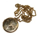 A 9 carat gold round locket on neckchain