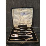 A set of six silver cake forks in presentation box