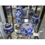 Chinese blue and white porcelain: baluster vase 22cm, jar 11.5cm and two lidded jars 15cm and