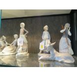 Six Lladro figures, including a boy in sailor costume, three of maids, a boy reclining and a donkey,