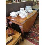 A mahogany George III style drop leaf table, the oval top on cabriole legs and club feet, 104cm