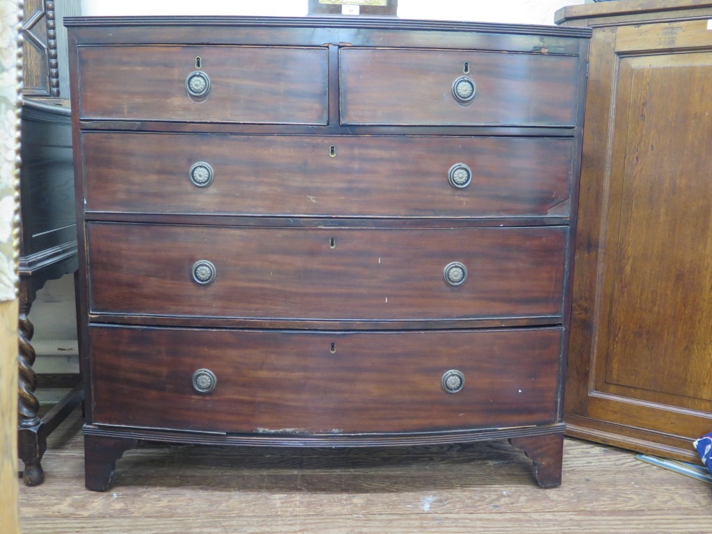 A 19th century mahogany bowfront chest of drawers, with two short and three long graduated drawers