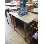 An oak side table, the rectangular top over turned and block legs joined by stretchers, 78.5cm wide