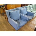 A 1960s three piece lounge suite, with angular wings and arms, sofa 205cm long (lacks seat and