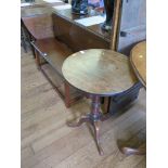 A mahogany tripod table, and a stained wood long stool