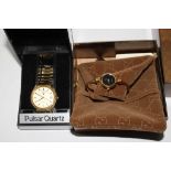 A ladies Gucci wristwatch in original box and a gentlemans Pulsar Quartz