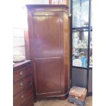 A mahogany corner wardrobe, with single panelled door, 97cm wide 197cm high