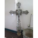 A cast iron pierced and foliate crucifix, 112cm high