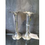 A pair of silver plated specimen vases