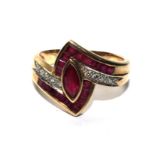 A ruby and diamond ring set in 9 carat gold