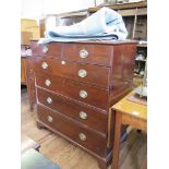 A late George III mahogany chest of drawers, the two short over four long graduated drawers on