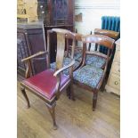 A matched set of four mahogany dining chairs with rail backs, drop-in seats and reeded tapering legs