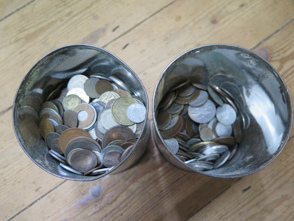 Two tubs of coins