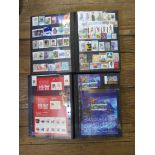 Two albums of World postage stamps including mini-sheets