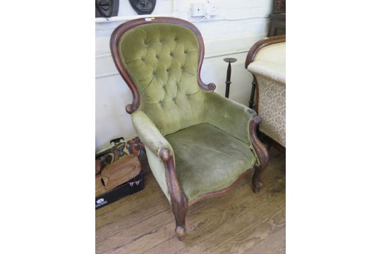 A Victorian mahogany gentleman's buttonback armchair, with moulded cabriole legs, as found