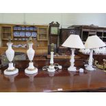 A pair of alabaster table lamps, another pair of giltmetal mounts and another table lamp (5)