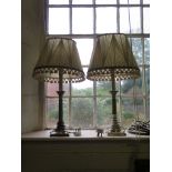 A pair of Corinthian column table lamps complete with shades