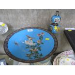 A Chinese Cloisonne plate, depicting a bird and butterfly amongst flowers on a blue ground 30cm