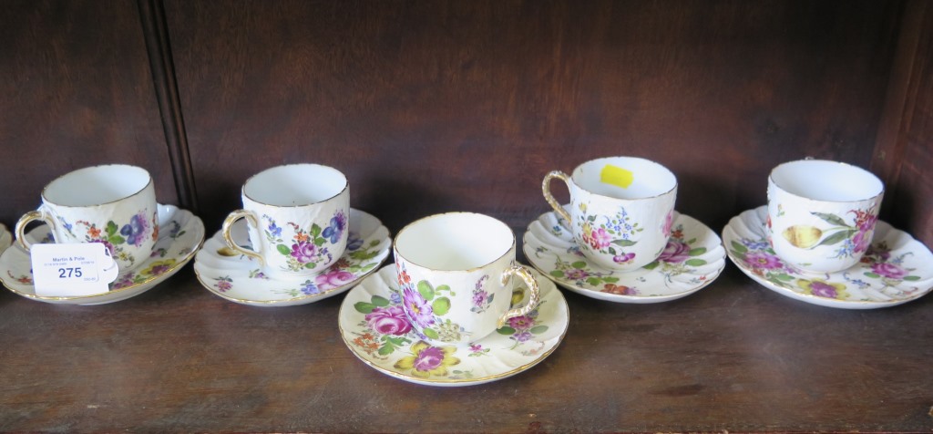 A set of ten German porcelain cup and saucers, each with painted floral decoration, 7.5cm high, tied - Image 2 of 4