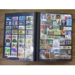 A stock book album of British Postage Stamps