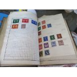 A Wanderer stamp album with World postage stamps