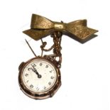 A ladies watch suspended from a bow