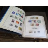 Four Minkus Publication Master Global stamp albums, containing World postage stamps