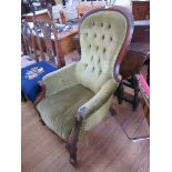 A Victorian mahogany gentleman's buttonback armchair, with moulded cabriole legs, as found