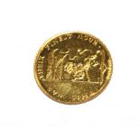 A Winston Churchill commemorative gold coin (This Was Their Finest Hour)