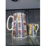 An Amberglade jug depicting floral design cigarette cards 22cm high and another smaller 12cm high