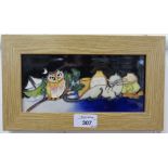 A Moorcroft pottery 'Owl and Pussycat' plaque, signed and dated 2013 9.5cm x 20.5cm, framed