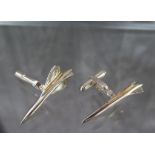 A pair of Concorde silver cufflinks