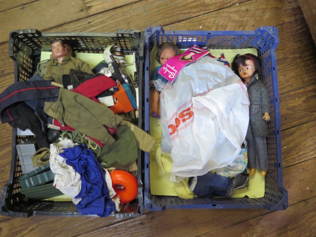 Three Action Man figures, with various uniforms and accessories, a Sindy Doll and other accessories