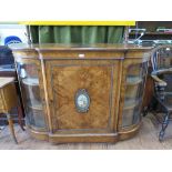 A Victorian burr walnut credenza, with boxwood stringing, the central panelled door inset with