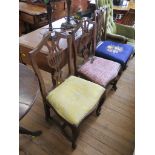 A pair of 19th century mahogany chairs, with pierced fret carved splats and cabriole legs joined