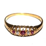 A diamond and synthetic ruby five stone ring