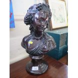 A pottery bust of a young classical maiden on plinth base, with a copper simulated finish, 40cm