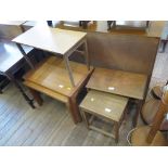 Three 1960s teak standard lamps, a Lloyd Loom corner basket, and seven various teak tables (11)