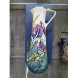 A Moorcroft Pottery Iris design jug designed and signed by Rachel Bishop, numbered MCC 2445, with