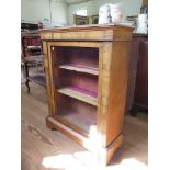A Victorian walnut and inlaid display cabinet, with single glazed door, velvet lined shelves and