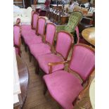 A set of eight stained beech French style dining chairs, with upholstered backs and moulded cabriole